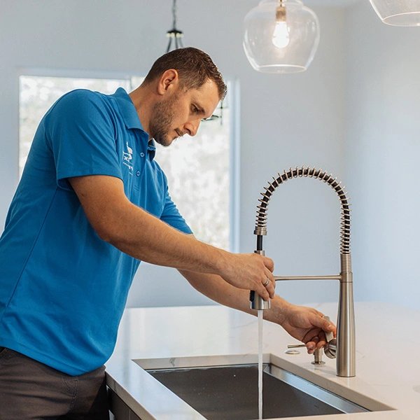 Pipedex plumber repairing a kitchen sink